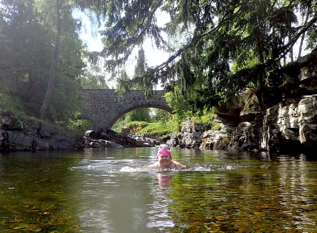 A swimmer enjoying a dip at Feshiebridge