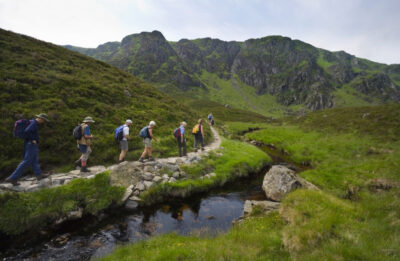 Walkers on path beside Fee Burn